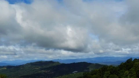 4K Time lapse of beautiful terrain and moving clouds, mountain views. Stock Footage 77196748