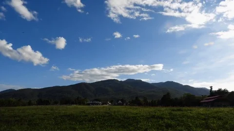 4K Time lapse of beautiful terrain and moving clouds, mountain views. Stock Footage 77196756