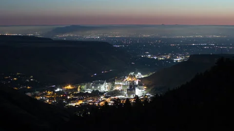 4K Time lapse birds eye view of Golden, Colorado city lights at dawn Stock Footage 215913314