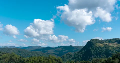 4K Time Lapse blue sky white cloud bright, clear cloudy scenery green mountain n Video stock 269091404