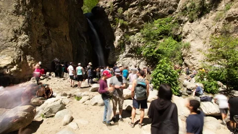 4K Time lapse blurred motion of a crowd at the Eaton Falls waterfall in summer Stock Footage 147998269