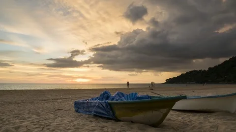 4K Time - lapse  boat with movement cloud and sunset at karon bech , PHUKET.. Stock Footage 74128102
