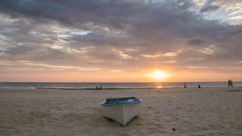 4K Time - lapse  boat with sunset at karon bech , PHUKET THAILAND. Stock Footage 74126172