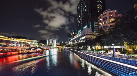 4K Time lapse of boats streaming past in Clarke quay Stock Footage 49716716