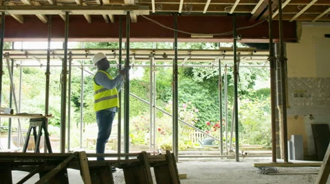4K Time lapse of busy construction team working together on building site Stock Footage 65165098