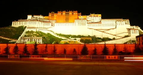 4k time lapse of busy traffic in front of the Potala at night in Lhasa,Tibet. Stock Footage 45643345