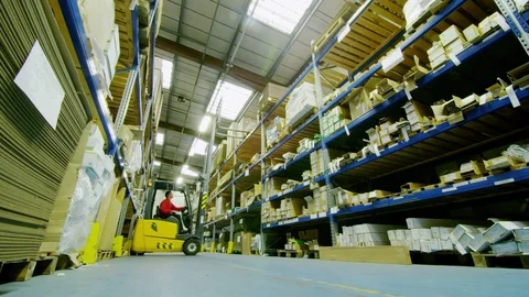 4K Time lapse busy workers in factory warehouse preparing goods for dispatch Stock Footage 72646959