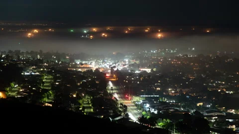 4K time lapse of cargo ships anchored off Coastal San Pedro on a foggy night Stock Footage 158816293
