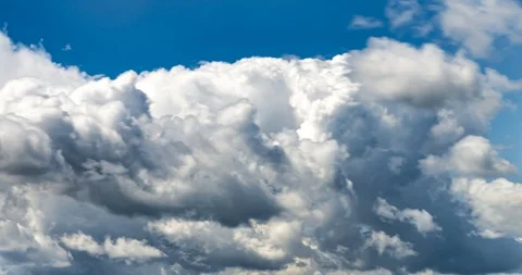 4k Time lapse clip of several cumulus fluffy curly rolling cloud layers Stock Footage 111970207