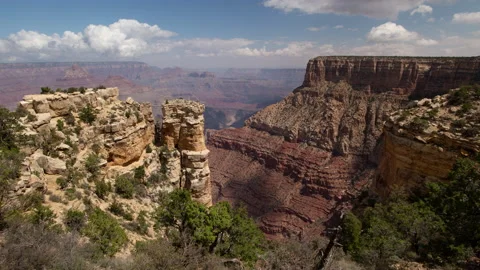 4K time lapse of clouds casting shadows on Grand Canyon cliffs at Moran Point Stock Footage 160562411