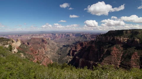 4K time lapse of clouds casting shadows on the north rim of the Grand Canyon Stock Footage 217403657