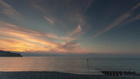 4K time lapse of clouds at dusk over the North Wales coast at Llandudno Stock Footage 156961846