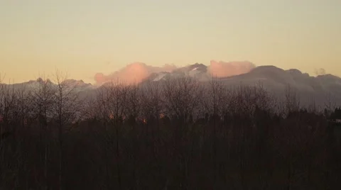 4K Time Lapse - Clouds over the mountains in winter Stock Footage 40605187