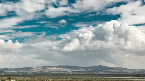 4k Time lapse of clouds in pure sky over the Judea Hills, Jerusalem, Israel Stock Footage 46961516