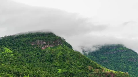 4K Time lapse clouds as the sky sunrise fog form misty nature ridge mountains  Stock Footage 148151670