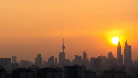 4K Time lapse cloudy and haze sunset over downtown Kuala Lumpur, Malaysia. Stock Footage 113678854