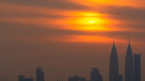 4K Time lapse cloudy and haze sunset over downtown Kuala Lumpur, Malaysia. Stock Footage 113740235