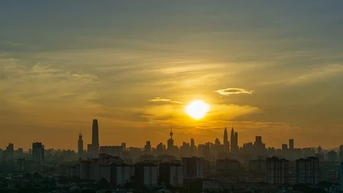 4K Time lapse cloudy and haze sunset over downtown Kuala Lumpur, Malaysia. Zoom Stock Footage 114017929