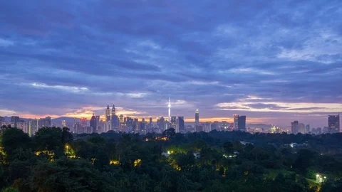 4K Time lapse of cloudy sunrise over downtown Kuala Lumpur, Malaysia. Stock Footage 90316940