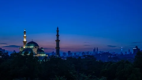 4K Time lapse of cloudy sunrise over Federal Mosque of Kuala Lumpur in Malaysia. Stock Footage 90511257