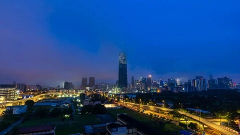 4K Time lapse of cloudy sunrise over Exchange 106 tower. Stock Footage 97858993
