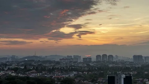 4K time lapse cloudy sunrise Petaling Jaya Malaysia Stock Footage