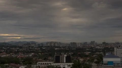 4K time lapse Cloudy sunrise with sunray Petaling Jaya ,Malaysia Stock Footage 144975799