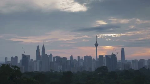 4K time lapse Cloudy sunrise of Kuala Lumpur skyline Stock Footage 145578008