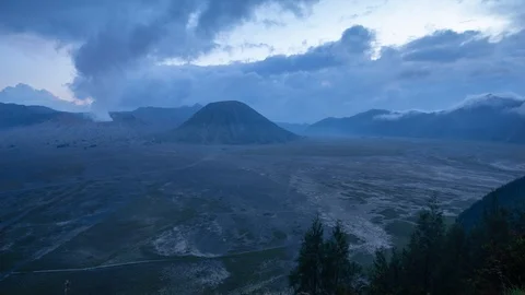 4K Time lapse of cloudy sunset over mountain range at Mount Bromo Stock Footage 88983421
