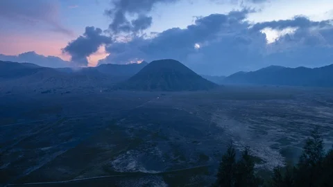 4K Time lapse of cloudy sunset over mountain range at Mount Bromo Stock Footage 88983424