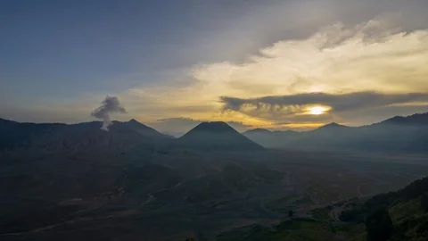 4K Time lapse of cloudy sunset over mountain range at Mount Bromo Stock Footage 88984785