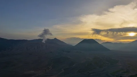 4K Time lapse of cloudy sunset over mountain range at Mount Bromo Stock Footage 88985347