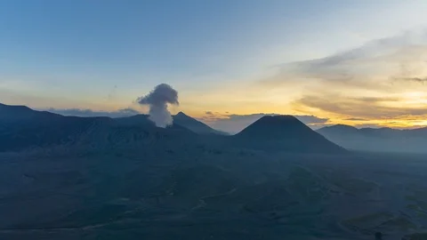 4K Time lapse of cloudy sunset over mountain range at Mount Bromo Stock Footage 88986527
