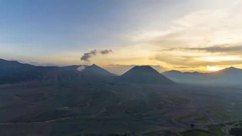 4K Time lapse of cloudy sunset over mountain range at Mount Bromo Stock Footage 88986528
