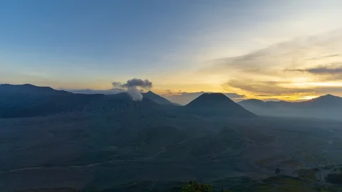 4K Time lapse of cloudy sunset over mountain range at Mount Bromo Stock Footage 88986529