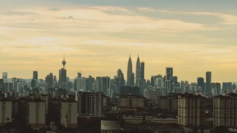 4K Time lapse of cloudy sunset over downtown Kuala Lumpur. Zoom In. Stock Footage 89147127