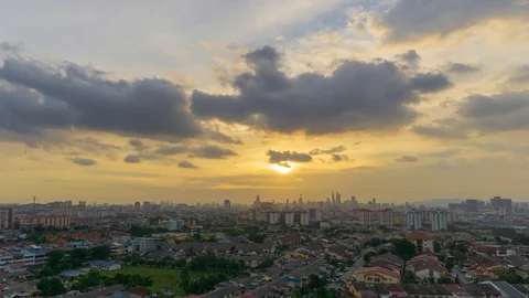 4K Time lapse of cloudy sunset over downtown Kuala Lumpur. Zoom In. Stock Footage 89153507