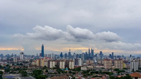 4K Time lapse of cloudy sunset over downtown Kuala Lumpur. Stock Footage 97904628