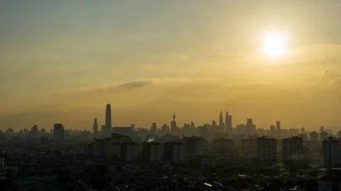 4K Time lapse of cloudy sunset over downtown Kuala Lumpur, Malaysia. Stock Footage 111329754