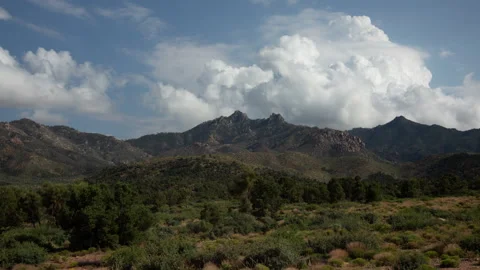 4K Time lapse of cumulus clouds in blue sky forming above the Hualapai Mountains Stock Footage 162083232
