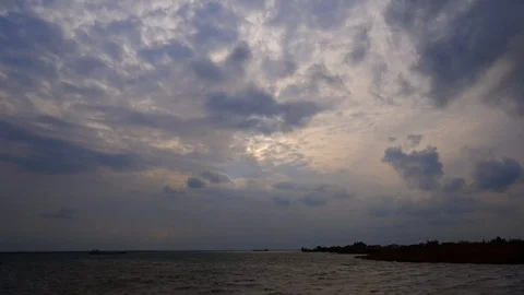 4K Time lapse. Dark storm clouds over the sea bay. Windy autumn sky, ships 動画素材 97199419