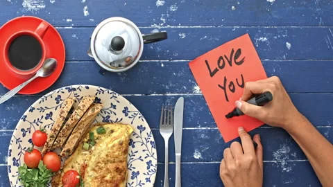 4k Time lapse of daughter preparing breakfast omelette and writing note for her Stock Footage 199615854