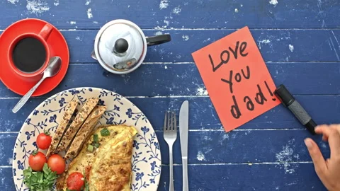 4k Time lapse of daughter preparing breakfast omelette and writing note for dad Stock Footage 199615857