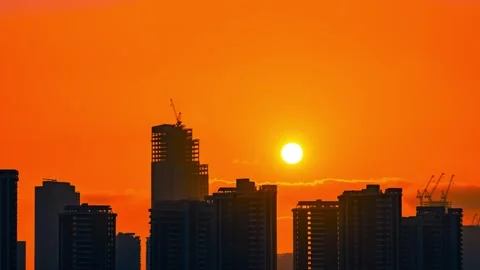 4K Time-lapse of Dawn of Hope Over Urban High-rises and City Life Video stock 341789794
