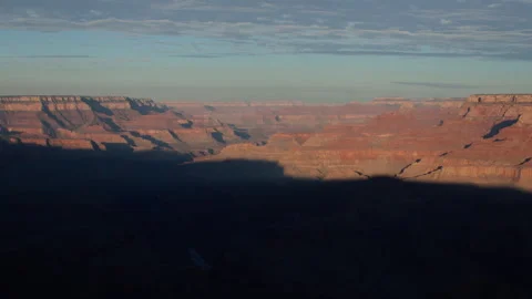 4K time lapse of dawn sunlight revealing Grand Canyon National Park Stock Footage 247781790