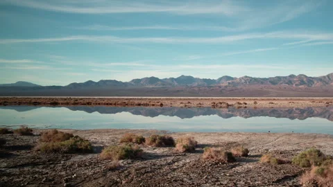 4K Time Lapse of Death Valley Mountains reflected in calm, glassy water Stock Footage 263523872