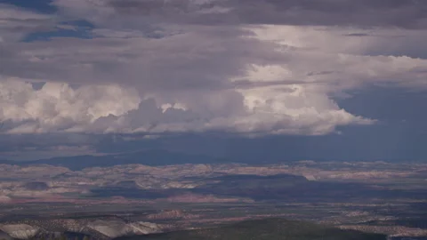 4K Time lapse of distant summer rain storms over Canaan Peak in Utah Stock Footage 158960449