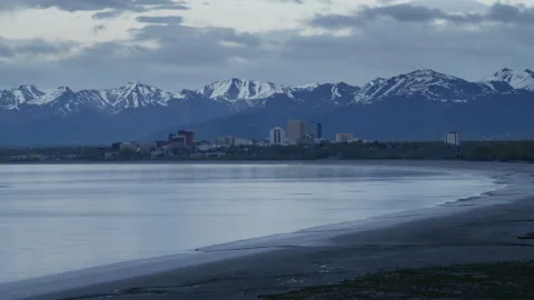 4K time lapse of the downtown Anchorage, Alaska shore on a cloudy sunset day Stock Footage 242837331