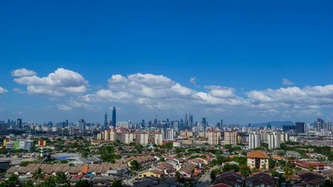 4K Time lapse of dramatic and fluffy moving clouds over Kuala Lumpur, Malaysia. Stock Footage 122271458