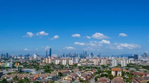 4K Time lapse of dramatic and fluffy moving clouds over Kuala Lumpur, Malaysia. Stock Footage 122271463